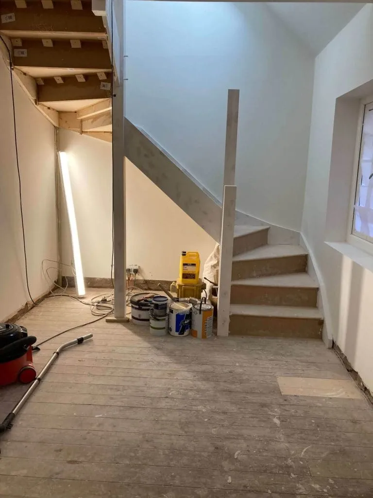 Hallway work, spiral staircase with white painted walls